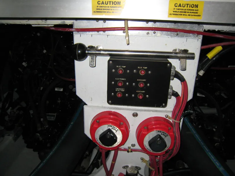Slide: The Image of Engine control panel of 1986 Sea Ray 340 Express Cruiser with switches and wiring. - 15