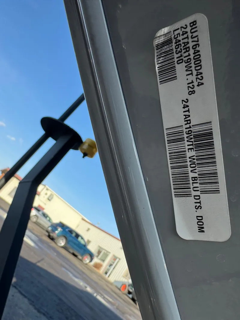 Slide: The Image of 2024 Tracker Targa V-19 WT boat with visible identification label and barcode. - 6