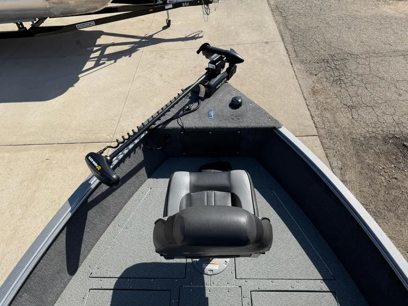 Slide: The Image of 2017 Lund 1650 Rebel XS SS boat with trolling motor and seat on deck. - 10