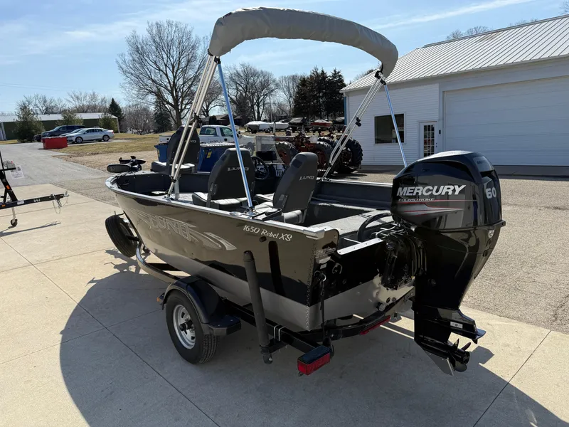 Slide: The Image of 2017 Lund 1650 Rebel XS SS boat with Mercury 60 engine on trailer. - 4