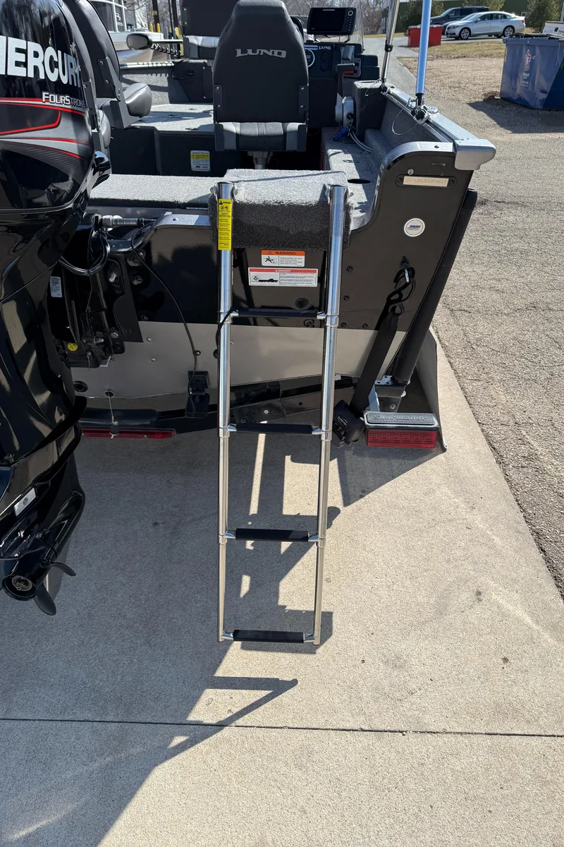 Slide: The Image of 2017 Lund 1650 Rebel XS SS boat with ladder and Mercury engine. - 8