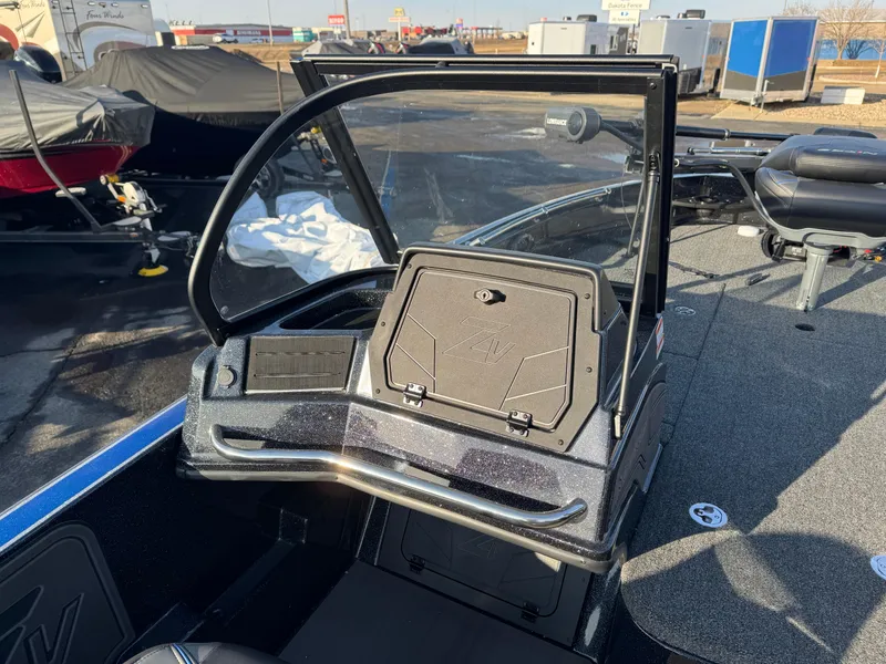 Slide: The Image of 2024 Nitro ZV21 Pro boat dashboard with windshield and storage compartment. - 10