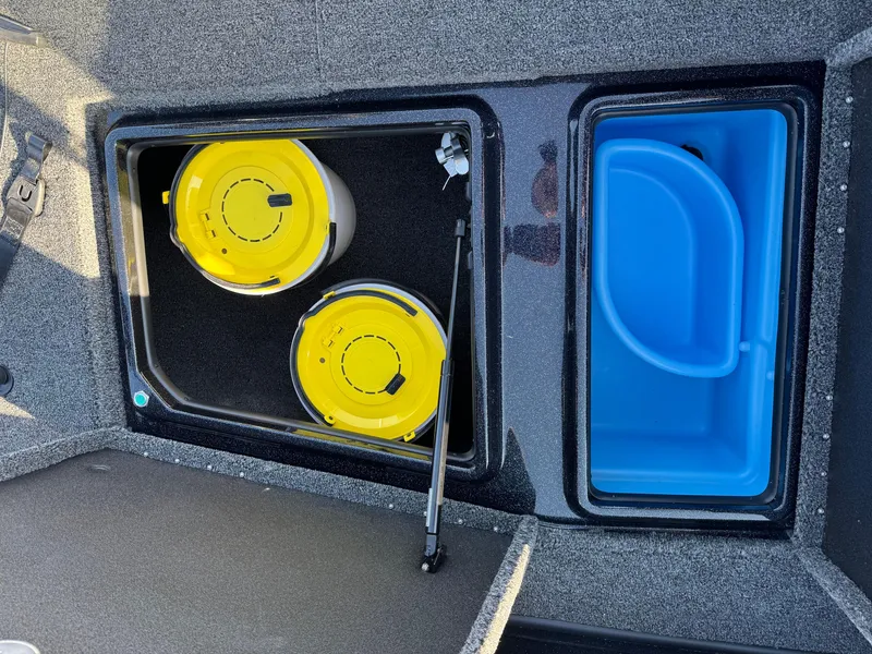 Slide: The Image of 2024 Nitro ZV21 Pro storage compartments with yellow and blue containers. - 11