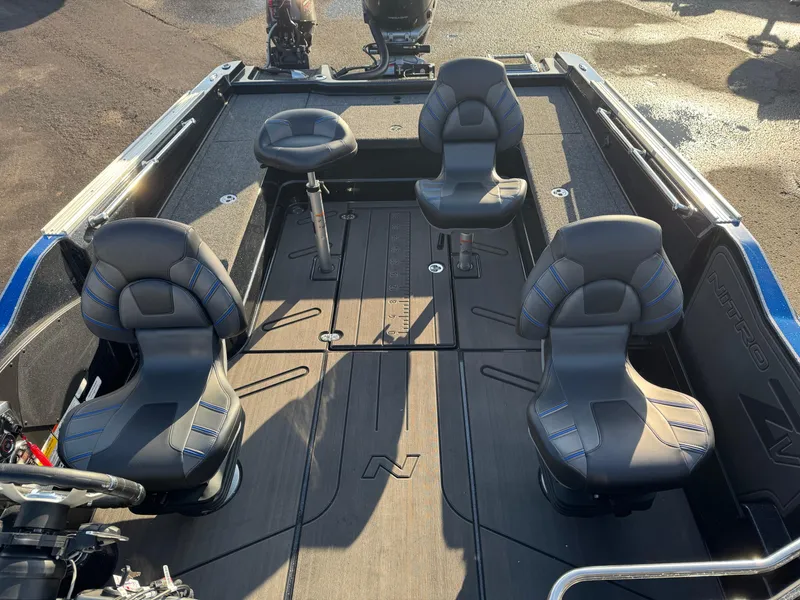 Slide: The Image of 2024 Nitro ZV21 Pro boat interior with four cushioned seats and sleek design. - 14