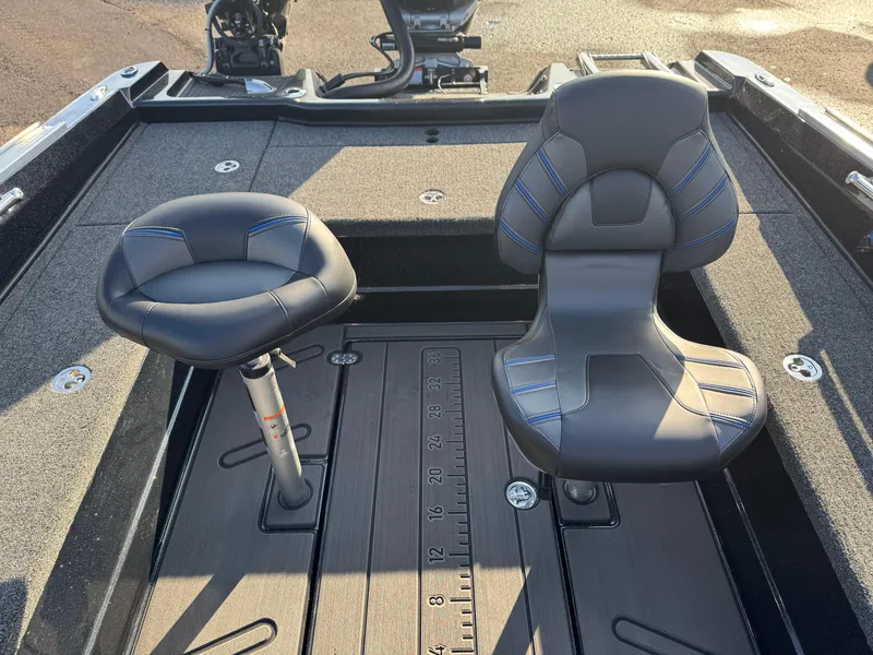 Slide: The Image of 2024 Nitro ZV21 Pro boat seats with measuring board on deck. - 6