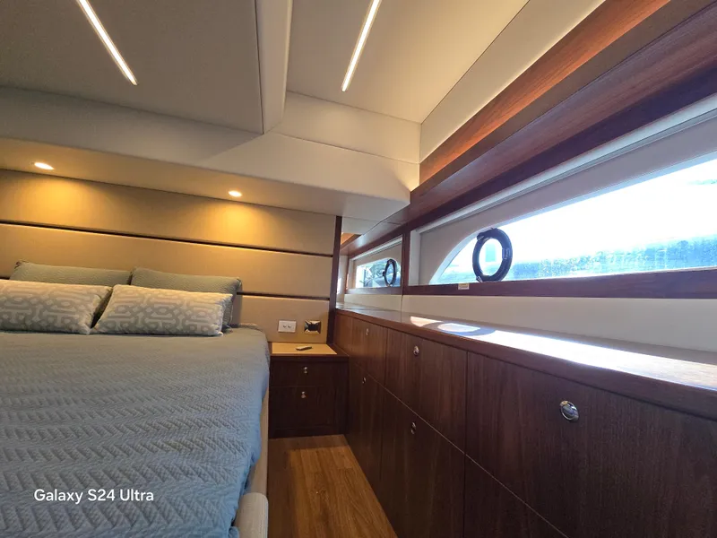 Slide: The Image of Riviera 54 Enclosed Flybridge 2022 - 54
