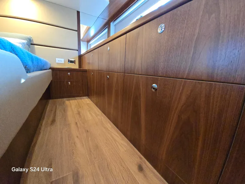 Slide: The Image of Riviera 54 Enclosed Flybridge 2022 - 55