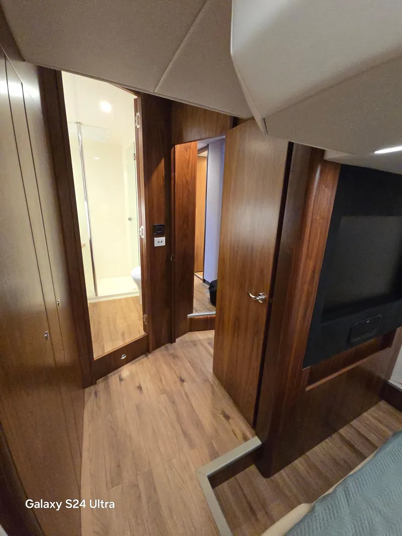 Slide: The Image of Riviera 54 Enclosed Flybridge 2022 - 56