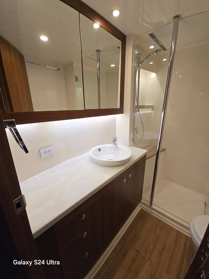 Slide: The Image of Riviera 54 Enclosed Flybridge 2022 - 64
