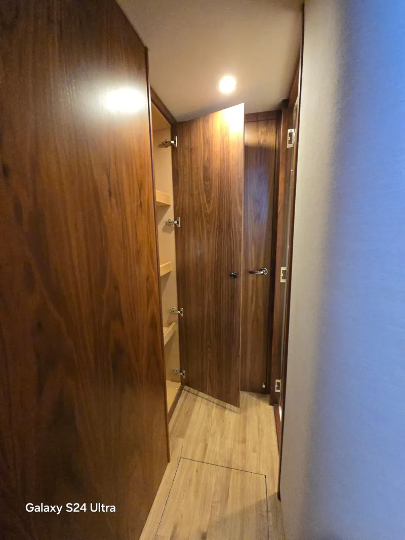 Slide: The Image of Riviera 54 Enclosed Flybridge 2022 - 85