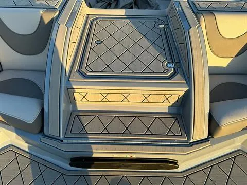 Slide: The Image of 2025 MB B52 25 Alpha boat interior with diamond-patterned seating and flooring. - 14