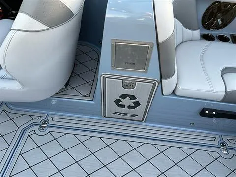 Slide: The Image of Interior of 2025 MB B52 25 Alpha boat with recycling bin and seating. - 18