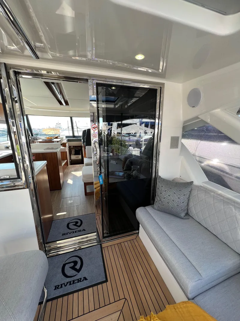 Slide: The Image of 2022 Riviera 505 SUV interior with modern seating and sleek design. - 19