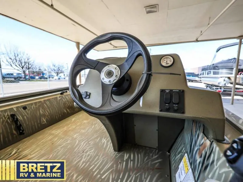 Slide: The Image of 2025 Grizzly 1754 SC boat steering console at Bretz RV & Marine showroom. - 13