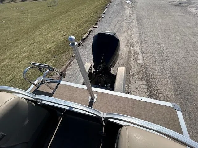 Slide: The Image of 2022 Sun Tracker Party Barge 22 XP3 pontoon boat with outboard motor on a trailer. - 11