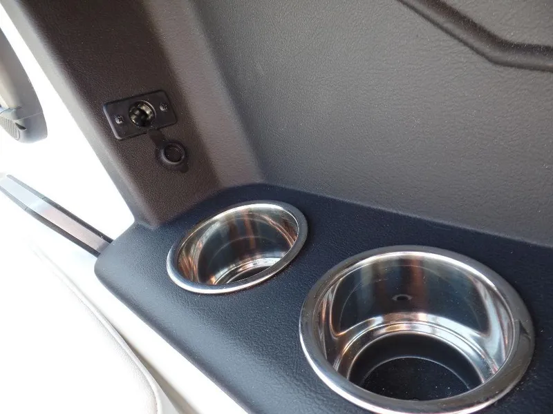 Slide: The Image of 2024 Axis T250 boat interior with dual stainless steel cup holders. - 7