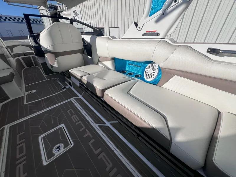 Slide: The Image of 2022 Centurion Fi25 boat interior with sleek seating and modern design. - 14