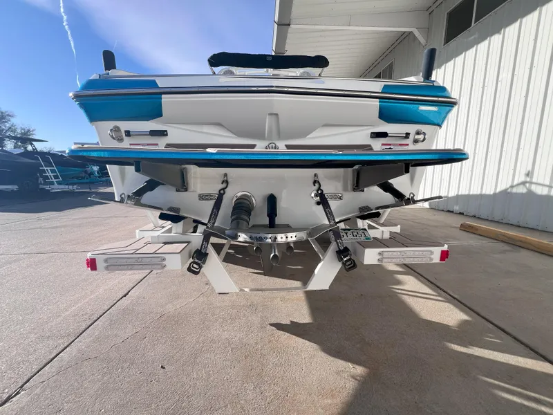 Slide: The Image of 2022 Centurion Fi25 boat rear view, showcasing sleek design and advanced features. - 6