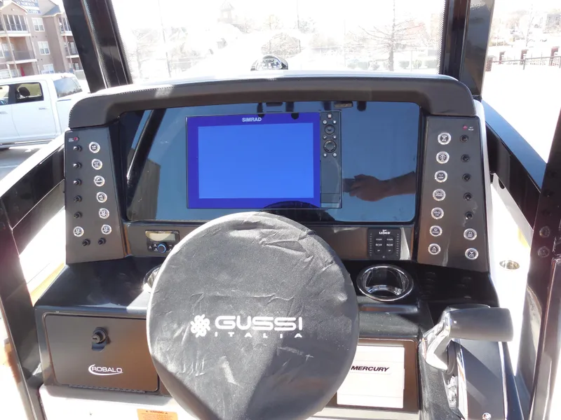 Slide: The Image of Dashboard of 2025 Robalo 246 Cayman boat with Gussi Italia steering wheel. - 7