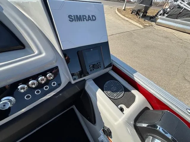 Slide: The Image of Control panel of 2025 Barletta Cabrio 22QC boat with Simrad navigation system. - 10