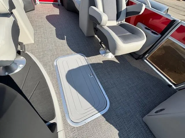 Slide: The Image of Interior of 2025 Barletta Cabrio 22QC pontoon boat with gray seating and flooring. - 20