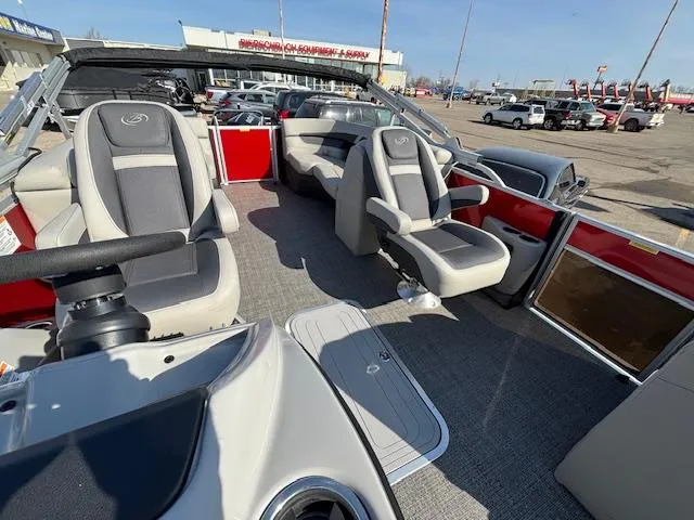 Slide: The Image of 2025 Barletta Cabrio 22QC pontoon boat interior with plush seating and modern design. - 21
