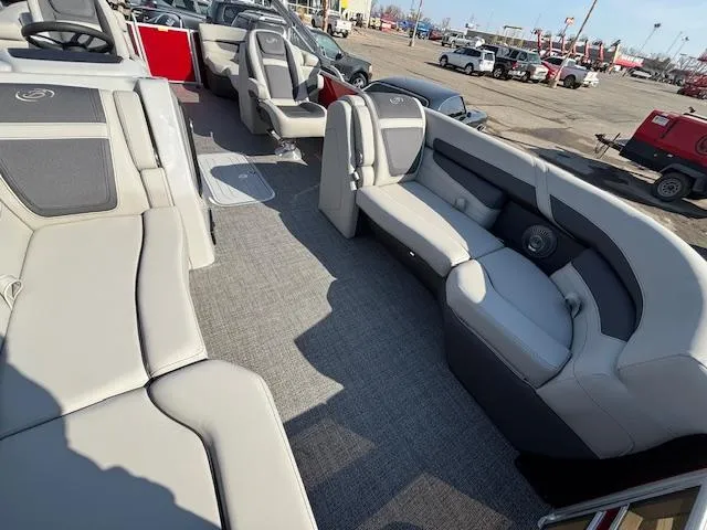 Slide: The Image of 2025 Barletta Cabrio 22QC pontoon boat interior with spacious seating and modern design. - 22