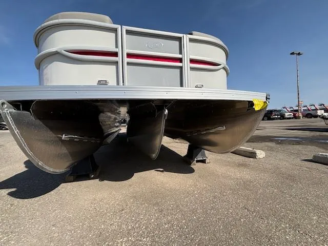 Slide: The Image of 2025 Barletta Cabrio 22QC pontoon boat, viewed from the front, showcasing its sleek design. - 28