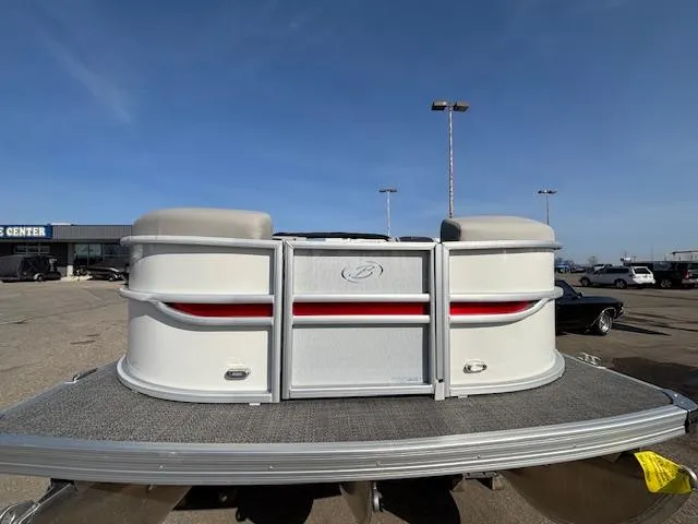 Slide: The Image of 2025 Barletta Cabrio 22QC pontoon boat, front view, parked outdoors. - 29