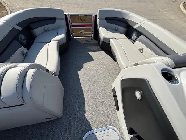 Slide: The Image of 2025 Barletta Cabrio 22QC boat interior with spacious seating and modern design. - 4