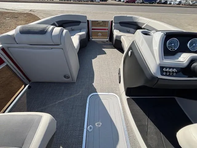 Slide: The Image of 2025 Barletta Cabrio 22QC pontoon boat interior with modern seating and dashboard. - 7