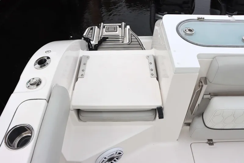Slide: The Image of 2023 Sea Fox 328 Commander boat interior with seating and storage features. - 10