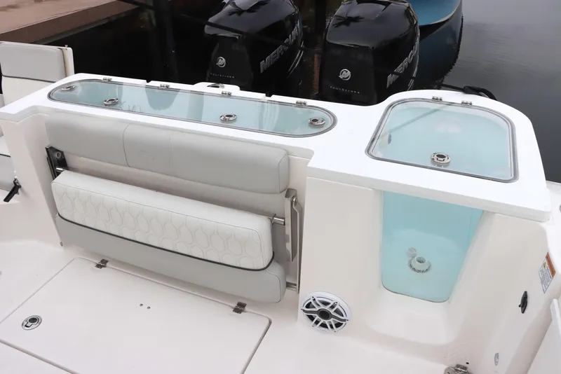 Slide: The Image of 2023 Sea Fox 328 Commander boat with seating and livewell features. - 11