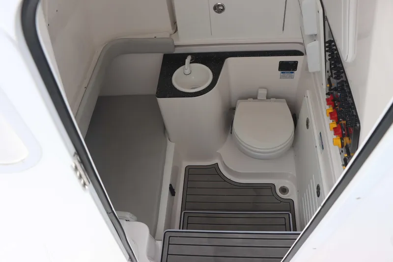 Slide: The Image of 2023 Sea Fox 328 Commander boat interior with toilet and sink. - 22
