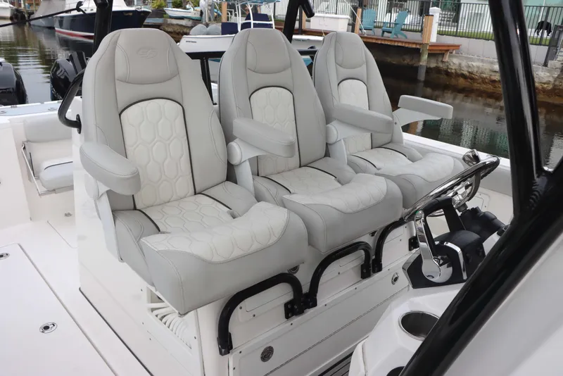 Slide: The Image of Three luxurious seats on a 2023 Sea Fox 328 Commander boat. - 23