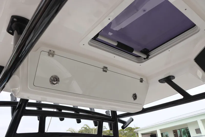 Slide: The Image of 2023 Sea Fox 328 Commander boat interior with storage compartment and hatch. - 27