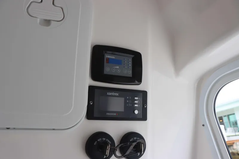 Slide: The Image of Control panel inside 2023 Sea Fox 328 Commander boat, featuring Xantrex display. - 31