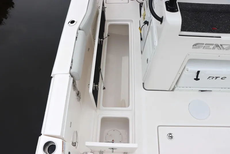 Slide: The Image of 2023 Sea Fox 328 Commander boat deck with storage compartments. - 35