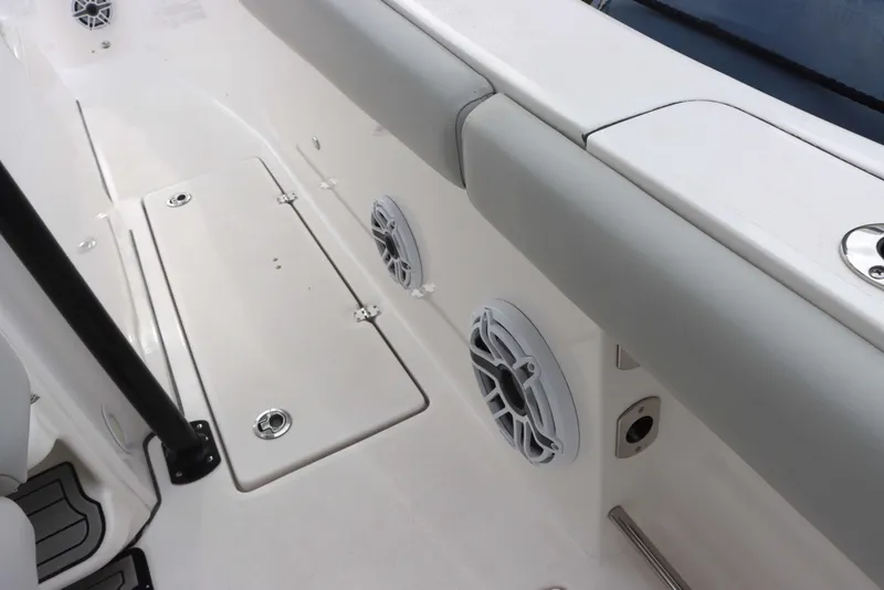 Slide: The Image of 2023 Sea Fox 328 Commander boat interior with speakers and storage compartments. - 8