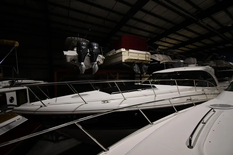 Slide: The Image of 2012 Cruisers Yachts 390 Sports Coupe in indoor storage facility. - 1
