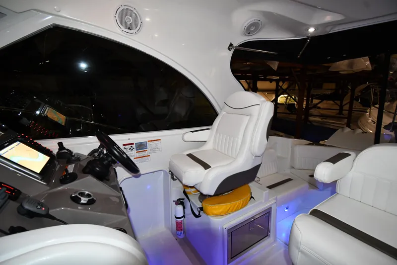Slide: The Image of 2012 Cruisers Yachts 390 Sports Coupe interior with modern helm and seating. - 13