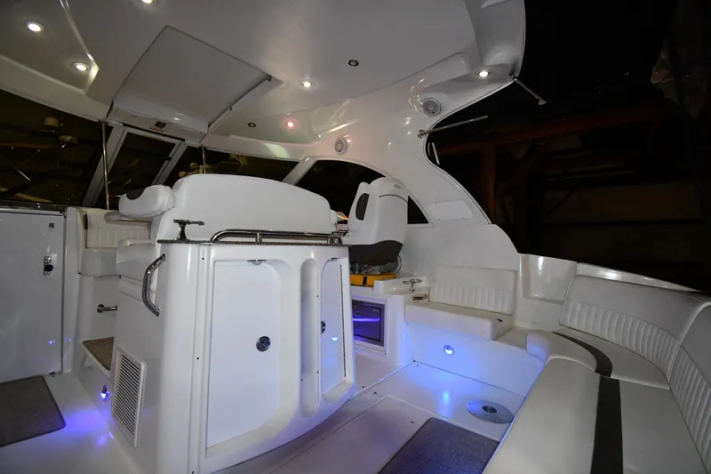 Slide: The Image of 2012 Cruisers Yachts 390 Sports Coupe interior with modern seating and ambient lighting. - 15