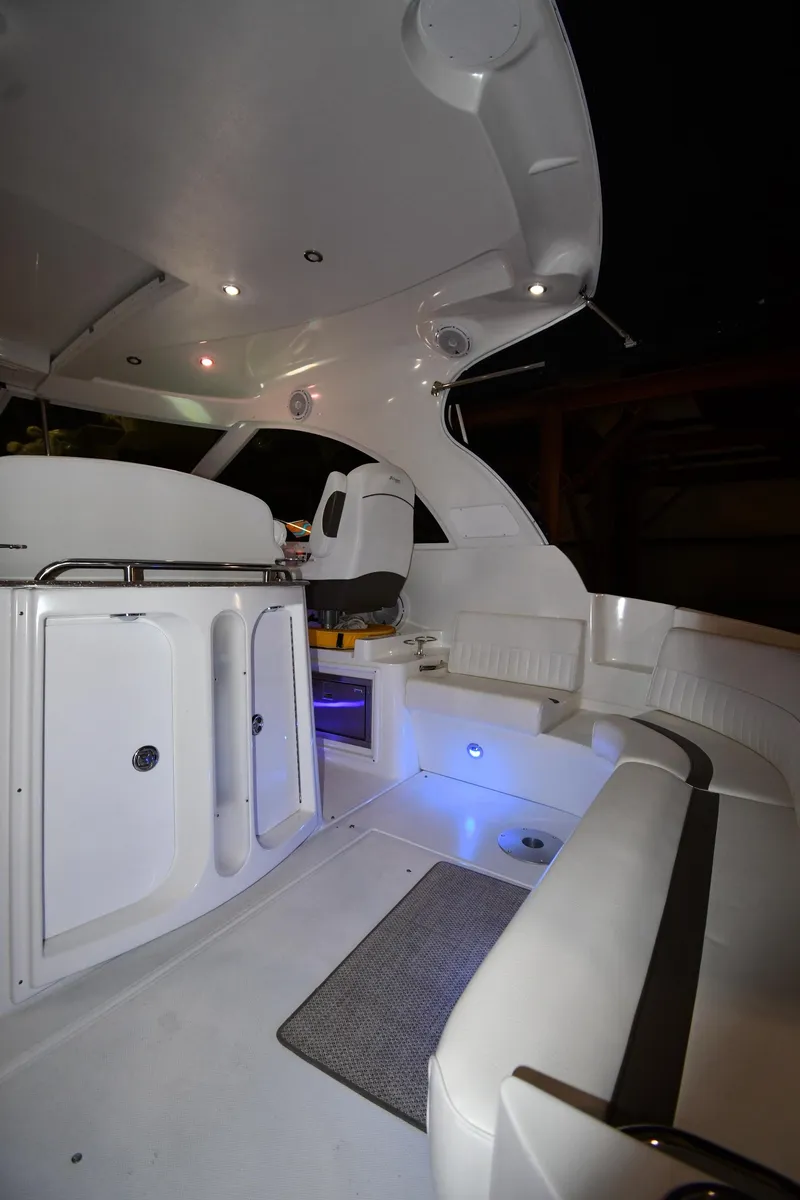 Slide: The Image of 2012 Cruisers Yachts 390 Sports Coupe interior with modern seating and ambient lighting. - 16