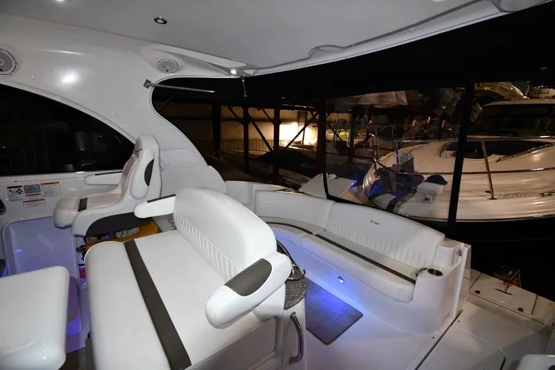 Slide: The Image of 2012 Cruisers Yachts 390 Sports Coupe interior with white seating and modern design. - 20