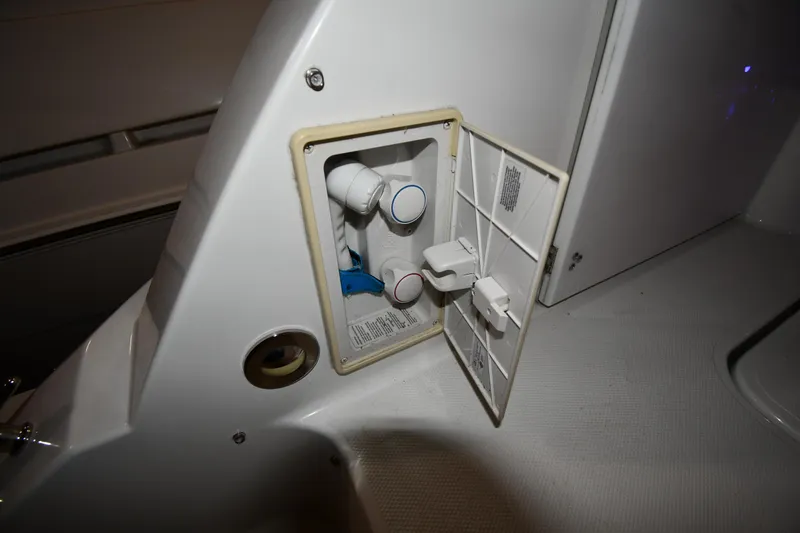 Slide: The Image of 2012 Cruisers Yachts 390 Sports Coupe utility compartment with open access panel. - 22