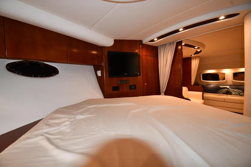Slide: The Image of Luxurious interior of 2012 Cruisers Yachts 390 Sports Coupe with cozy bed and modern amenities. - 32