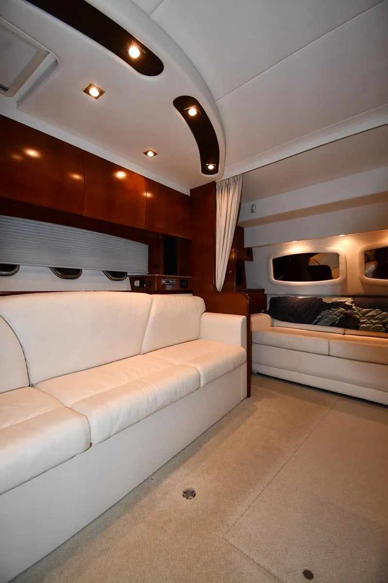 Slide: The Image of Interior of 2012 Cruisers Yachts 390 Sports Coupe with elegant seating and modern lighting. - 40