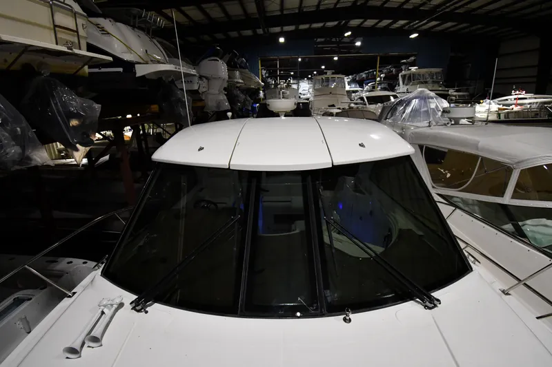 Slide: The Image of 2012 Cruisers Yachts 390 Sports Coupe in indoor storage facility. - 7