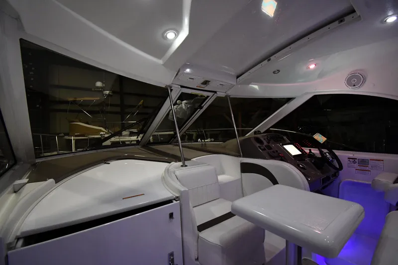 Slide: The Image of Interior of 2012 Cruisers Yachts 390 Sports Coupe with modern cockpit design. - 8
