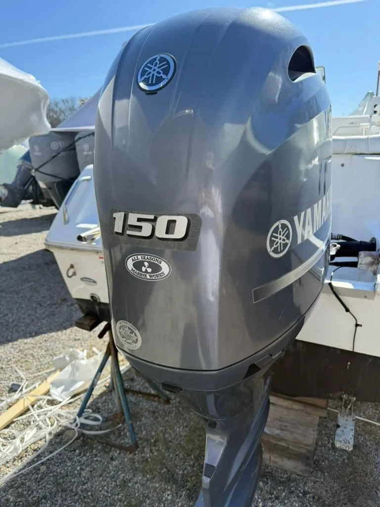 Slide: The Image of Yamaha 150 outboard motor on a 2016 Sea Hunt Escape 211 boat. - 5
